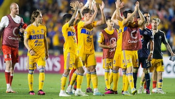 Mexico's Tigres players celebrate the end of the game against Honduras's Motagua during the CONCACAF Champions League football match at the Universitario stadium in Monterrey, Mexico, on April 13, 2023. (Photo by Julio Cesar AGUILAR / AFP)