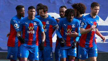 Crystal Palace&#039;s Serbian midfielder Luka Milivojevic (3L) celebrates scoring the opening goal during the English Premier League football match between Crystal Palace and West Bromwich Albion at Selhurst Park in south London on March 13, 2021. (Photo 