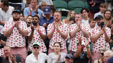 Tennis - Wimbledon - All England Lawn Tennis and Croquet Club, London, Britain - July 8, 2024 Spectators applaud Russia's Anna Kalinskaya in the stands as she leaves the court after retiring injured from her fourth round match against Kazakhstan's Elena Rybakina REUTERS/Paul Childs