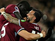 West Ham United's Greek defender #15 Konstantinos Mavropanos (C) celebrates scoring the team's fourth goal with West Ham United's Argentinian striker #11 Taty Castellanos (R) and West Ham United's Senegalise defender #12 El Hadji Malick Diouf during the English Premier League football match between West Ham United and Wolverhampton Wanderers at the London Stadium, in east London on April 10, 2026. (Photo by Ben STANSALL / AFP) / RESTRICTED TO EDITORIAL USE. No use with unauthorized audio, video, data, fixture lists, club/league logos or 'live' services. Online in-match use limited to 120 images. An additional 40 images may be used in extra time. No video emulation. Social media in-match use limited to 120 images. An additional 40 images may be used in extra time. No use in betting publications, games or single club/league/player publications. /