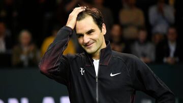 Switzerland&#039;s Roger Federer reacts as he speaks to the audience after victory over Netherlands Robin Haase in their quarter-final singles tennis match for the ABN AMRO World Tennis Tournament in Rotterdam on February 16, 2018. 
 Roger Federer became 