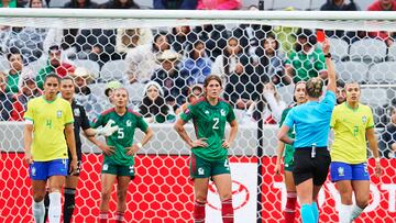 Referee Mary Tori Penso of USA show yellow card to Nicolette Hernandez of Mexico during the Semifinals match between Brazil and Mexico (Mexican National Team) as part of the Concacaf Womens Gold Cup 2024, at Snapdragon Stadium on March 06, 2024 in San Diego, California, United States.