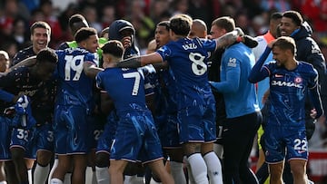 Chelsea players celebrate after the English Premier League football match between Nottingham Forest and Chelsea at The City Ground in Nottingham, central England, on May 25, 2025. Chelsea won the match 1-0. (Photo by Ben STANSALL / AFP) / RESTRICTED TO EDITORIAL USE. No use with unauthorized audio, video, data, fixture lists, club/league logos or 'live' services. Online in-match use limited to 120 images. An additional 40 images may be used in extra time. No video emulation. Social media in-match use limited to 120 images. An additional 40 images may be used in extra time. No use in betting publications, games or single club/league/player publications. /