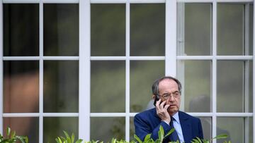 (FILES) In this file photo taken on June 04, 2019 French Football Federation (FFF) president Noel le Graet speaks on the phone prior to the arrival of French President in Clairefontaine-en-Yvelines, southwest of Paris, during the French women national foo