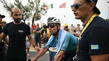 Astana Qazaqstan Team's British rider Mark Cavendish arrives at the finish area inside the cutoff during of the 111th edition of the Tour de France cycling race, 206 km between Florence and Rimini, in Italy, on June 29, 2024. (Photo by Marco BERTORELLO / AFP)