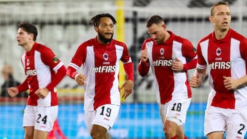 Antwerp's Nigerian forward #19 Chidera Ejuke celebrates with teammates after scoring his team's second goal during the Belgian Pro League first division football match between Cercle Brugge KSV and Royal Antwerp FC at the Jan Breydel Stadium in Brugge, on December 9 2023. (Photo by VIRGINIE LEFOUR / Belga / AFP) / Belgium OUT