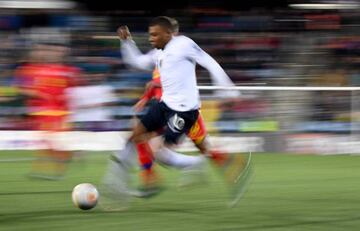 Kylian Mbappe runs with the ball during the UEFA Euro 2020 qualification football match between Andorra and France.