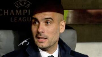 El director técnico del Bayern Munich, Pep Guardiola, observa las acciones ante el Arsenal hoy, martes 11 de marzo de 2014, durante el partido de vuelta de octavos de final de la Liga de Campeones de la UEFA en Múnich (Alemania).