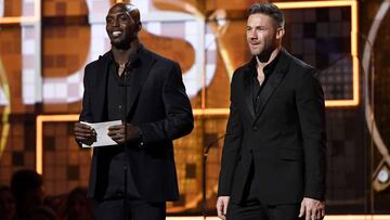 LOS ANGELES, CALIFORNIA - FEBRUARY 10: Devin McCourty (L) and Julian Edelman speak onstage during the 61st Annual GRAMMY Awards at Staples Center on February 10, 2019 in Los Angeles, California.   Kevork Djansezian/Getty Images/AFP
 == FOR NEWSPAPERS, INTERNET, TELCOS &amp; TELEVISION USE ONLY ==