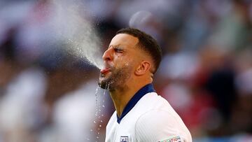 Soccer Football - Euro 2024 - Quarter Final - England v Switzerland - Dusseldorf Arena, Dusseldorf, Germany - July 6, 2024 England's Kyle Walker spits water out of his mouth before the start of the second half REUTERS/Lee Smith