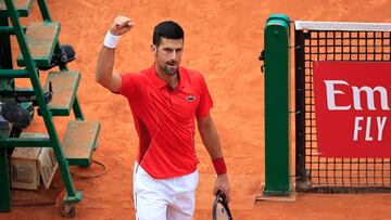 Serbia's Novak Djokovic celebrates after winning against Russia's Roman Safiullin at the end of their Monte Carlo ATP Masters Series Tournament round of 32 tennis match on the Rainier III court at the Monte Carlo Country Club on April 9, 2024. (Photo by Valery HACHE / AFP)