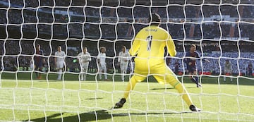 Lionel Messi of Barcelona scores his side's second goal from the penalty spot.