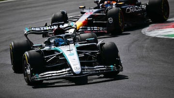 Mercedes' British driver George Russell drives ahead of Red Bull Racing's Mexican driver Sergio Perez during third practice session, ahead of the Italian Formula One Grand Prix at Autodromo Nazionale Monza circuit, in Monza on August 31, 2024. (Photo by Andrej ISAKOVIC / AFP)
