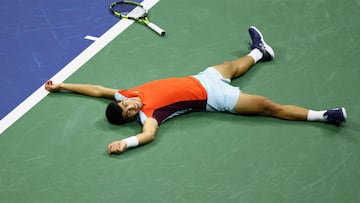 NEW YORK, NEW YORK - SEPTEMBER 09: Carlos Alcaraz of Spain celebrates after defeating Frances Tiafoe of the United States during their Men�s Singles Semifinal match on Day Twelve of the 2022 US Open at USTA Billie Jean King National Tennis Center on September 09, 2022 in the Flushing neighborhood of the Queens borough of New York City. Elsa/Getty Images/AFP