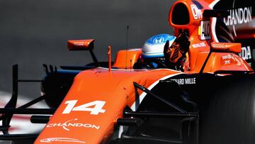 MONTMELO, SPAIN - MAY 13:  Fernando Alonso of Spain driving the (14) McLaren Honda Formula 1 Team McLaren MCL32 waves to the crowd after qualifying in 7th position on the grid during qualifying for the Spanish Formula One Grand Prix at Circuit de Catalunya on May 13, 2017 in Montmelo, Spain.  (Photo by David Ramos/Getty Images)