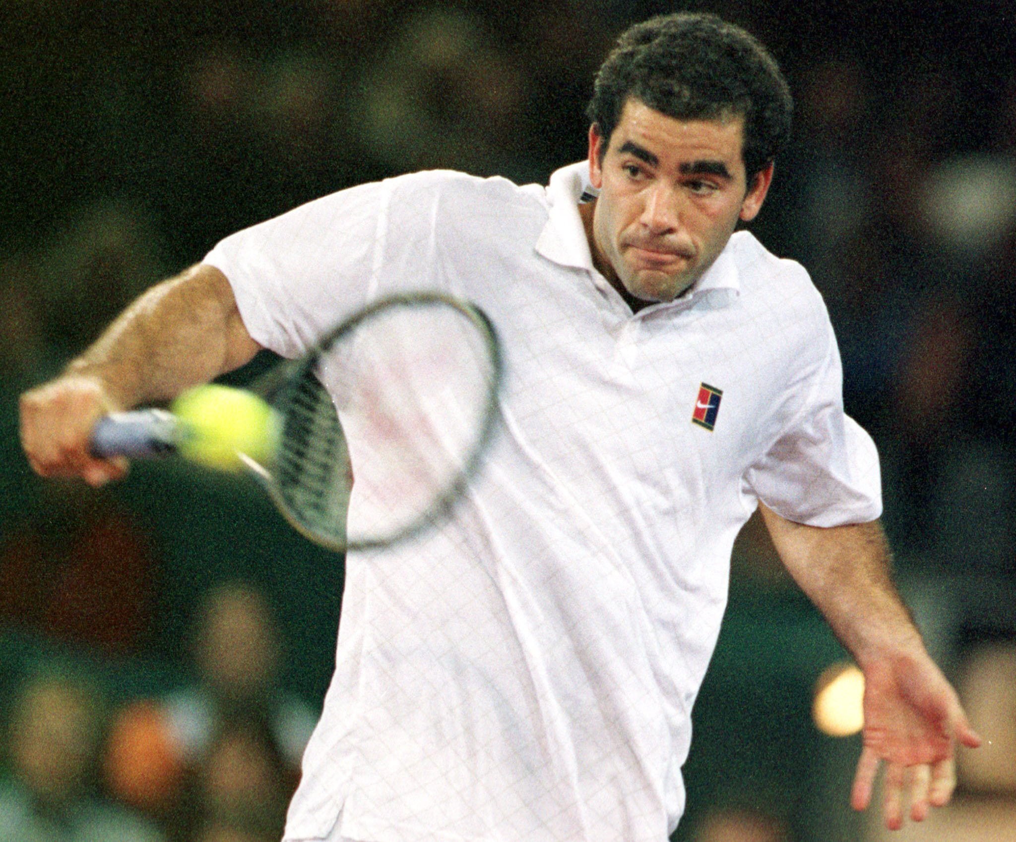 ATP10 - 19991124 - HANOVER, GERMANY: US player Pete Sampras plays a backhand against his compatriot Andre Agassi on Wednesday, 24 November, 1999, during their Round Robin match at the ATP-Tour-World Championships in Hanover. Agassi won in straight sets 6-2, 6-2. EPA PHOTO DPA/HOLGER HOLLEMANN