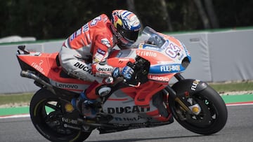 Dovizioso triumphs as Márquez's milestone race proves a struggle
