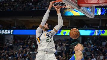 Feb 10, 2020; Dallas, Texas, USA; Utah Jazz center Rudy Gobert (27) dunks the ball over Dallas Mavericks forward Kristaps Porzingis (6) during the second half at the American Airlines Center. Mandatory Credit: Jerome Miron-USA TODAY Sports