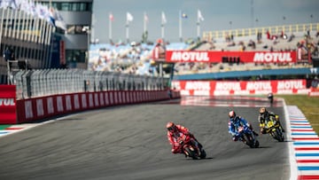 ASSEN, NETHERLANDS - JUNE 25: Francesco Bagnaia of Italy and Ducati Lenovo Team rides in front of Alex Rins of Spain and Team SUZUKI ECSTAR and Luca Marini of Italy and Mooney VR46 Racing Team David during the qualifying session of the MotoGP Motul TT Assen at TT Circuit Assen on June 25, 2022 in Assen, Netherlands. (Photo by Steve Wobser/Getty Images)