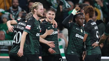 Sporting Lisbon's Spanish defender #22 Ivan Fresneda (3L) celebrates scoring his team's third goal during the Portuguese League football match between Sporting CP and CF Estrela da Amadora at Jose Alvalade stadium in Lisbon on November 30, 2025. (Photo by PATRICIA DE MELO MOREIRA / AFP)