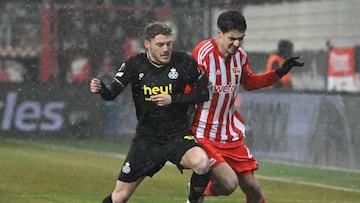 Union Saint-Gilloise's Belgian forward Yorbe Vertessen (L) and Union Berlin's Portuguese defender Diogo Leite vie for the ball during the UEFA Europa League round of 16, 1st-leg football match between FC Union Berlin and Union Saint-Gilloise in Berlin, on March 9, 2023. (Photo by Tobias SCHWARZ / AFP) (Photo by TOBIAS SCHWARZ/AFP via Getty Images)