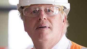 Britain's Prime Minister Boris Johnson reacts during his visit to a construction site at The County Hospital in Hereford, western England on August 11, 2020, to see the how the NHS hospital is expanding to provide 72 new beds over three new wards. (Photo by Matthew Horwood / POOL / AFP)