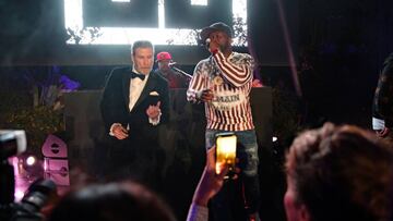 CAP D&#039;ANTIBES, FRANCE - MAY 15:  John Travolta and Singer 50 Cent ( Curtis James Jackson III ) on stage during the party in Honour of John Travolta&#039;s receipt of the Inaugural Variety Cinema Icon Award during the 71st annual Cannes Film Festival at Hotel du Cap-Eden-Roc on May 15, 2018 in Cap d&#039;Antibes, France. (Photo by Gisela Schober/Getty Images)