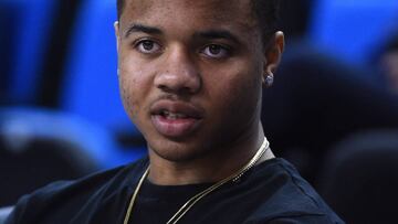 LOS ANGELES, CA - MARCH 1: Markelle Fultz #20 of the Washington Huskies, who is not playing due to a sore knee, sits on the bench before the game against the UCLA Bruins at Pauley Pavilion on March 1, 2017 in Los Angeles, California.   Jayne Kamin-Oncea/Getty Images/AFP.
 == FOR NEWSPAPERS, INTERNET, TELCOS &amp; TELEVISION USE ONLY ==