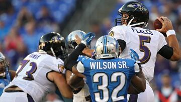 BALTIMORE, MD - AUGUST 27: Quarterback Joe Flacco #5 of the Baltimore Ravens looks to pass in front of defensive back Tavon Wilson #32 of the Detroit Lions during the first half in their preseason game at M&amp;T Bank Stadium on August 27, 2016 in Baltimore, Maryland.   Patrick Smith/Getty Images/AFP
 == FOR NEWSPAPERS, INTERNET, TELCOS &amp; TELEVISION USE ONLY ==