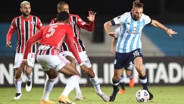 Soccer Football - Copa Libertadores - Group E - Racing Club v Sao Paulo - Estadio Presidente Juan Domingo Peron, Buenos Aires, Argentina - May 5, 2021 Racing Club&#039;s Ignacio Piatti in action with Sao Paulo&#039;s Robert Arboleda Pool via REUTERS/Marce