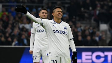 Marseille's Chilean forward Alexis Sanchez reacts during the French L1 football match between Olympique Marseille (OM) and Paris Saint-Germain (PSG) at the Velodrome stadium in Marseille, southern France on February 26, 2023. (Photo by NICOLAS TUCAT / AFP)