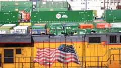 LOS ANGELES, CALIFORNIA - NOVEMBER 21: A freight train engine (BOTTOM) and shipping containers are viewed in a Union Pacific Intermodal Terminal rail yard on November 21, 2022 in Los Angeles, California. A national rail strike could occur as soon as December 5 after the nation’s largest freight rail union, SMART Transportation Division, voted to reject the Biden administration’s contract deal. About 30 percent of the nation’s freight is moved by rail with the Association of American Railroads estimating that a nationwide shutdown could cause $2 billion a day in economic losses. (Photo by Mario Tama/Getty Images)