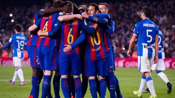 Players of FC Barcelona celebrate after their teammate Lionel Messi scored their second team's goal with a penalty shot during the La Liga match between FC Barcelona and CD Leganes at Camp Nou stadium on February 19, 2017 in Barcelona, Spain.