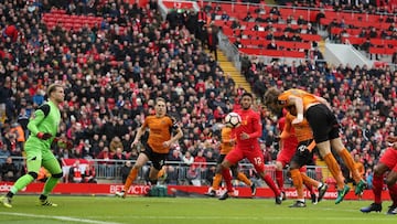 LIVERPOOL, ENGLAND - JANUARY 28: Richard Stearman of Wolverhampton Wanderers scores a goal to make it 0-1 during The Emirates FA Cup Fourth Round between Liverpool and Wolverhampton Wanderers at Anfield on January 28, 2017 in Liverpool, England. (Photo by Matthew Ashton - AMA/Getty Images)