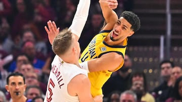 Tyrese Haliburton #0 of the Indiana Pacers passes over Sam Merrill #5 of the Cleveland Cavaliers during the second quarter of game one of the Eastern Conference Semifinals at Rocket Arena on May 04, 2025 in Cleveland, Ohio.