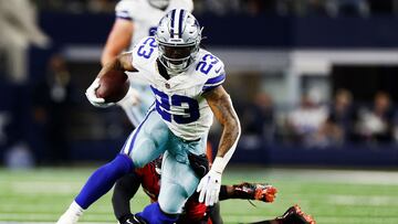 ARLINGTON, TEXAS - DECEMBER 22: Rico Dowdle #23 of the Dallas Cowboys runs with the ball during the second quarter against the Tampa Bay Buccaneers at AT&T Stadium on December 22, 2024 in Arlington, Texas. Ron Jenkins/Getty Images/AFP (Photo by Ron Jenkins / GETTY IMAGES NORTH AMERICA / Getty Images via AFP)