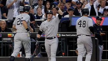 NEW YORK, NEW YORK - JUNE 13: Billy McKinney #57 of the New York Yankees congratulates teammates DJ LeMahieu #26 and Anthony Rizzo #48 of the New York Yankees after LeMahieu hit a two run home run in the fourth inning against the New York Mets at Citi Field on June 13, 2023 in the Flushing neighborhood of the Queens borough of New York City.   Elsa/Getty Images/AFP (Photo by ELSA / GETTY IMAGES NORTH AMERICA / Getty Images via AFP)