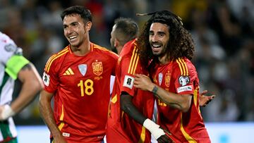 Spain's defender #22 Marc Cucurella (R) celebrates with teammates Spain's midfielder #18 Martin Zubimendi and Spain's midfielder #17 Nico Williams after he scored the team's second goal during the FIFA World Cup 2026 Group E European qualification football matches between Bulgaria and Spain, at the Vassil Levski stadium in Sofia on September 4, 2025. (Photo by Nikolay DOYCHINOV / AFP)