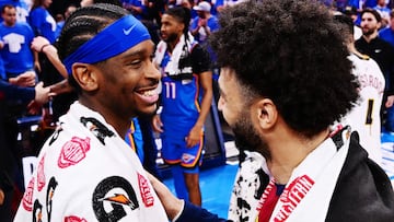 OKLAHOMA CITY, OKLAHOMA - MAY 18: Shai Gilgeous-Alexander #2 of the Oklahoma City Thunder and Jamal Murray #27 of the Denver Nuggets meet after Game Seven of the Western Conference Second Round NBA Playoffs at Paycom Center on May 18, 2025 in Oklahoma City, Oklahoma. The Oklahoma City Thunder beat the Denver Nuggets 125-93. NOTE TO USER: User expressly acknowledges and agrees that, by downloading and or using this photograph, User is consenting to the terms and conditions of the Getty Images License Agreement. Joshua Gateley/Getty Images/AFP (Photo by Joshua Gateley / GETTY IMAGES NORTH AMERICA / Getty Images via AFP)
