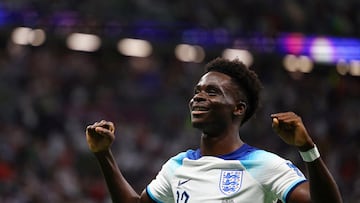 Soccer Football - FIFA World Cup Qatar 2022 - Round of 16 - England v Senegal - Al Bayt Stadium, Al Khor, Qatar - December 4, 2022 England's Bukayo Saka celebrates scoring their third goal REUTERS/Kai Pfaffenbach     TPX IMAGES OF THE DAY