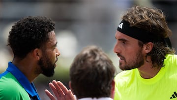 Greece's Stefanos Tsitsipas (R) argues with France's Arthur Fils during their men's singles match for the ATP Rome Open tennis tournament at Foro Italico in Rome on May 11, 2025. (Photo by MARCO BERTORELLO / AFP)
