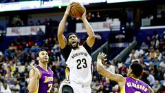 Nov 29, 2016; New Orleans, LA, USA; New Orleans Pelicans forward Anthony Davis (23) drives between Los Angeles Lakers forward Larry Nance Jr. (7) and guard Jordan Clarkson (6) during the second half of a game at the Smoothie King Center. The Pelicans defeated the Lakers 105-88. Mandatory Credit: Derick E. Hingle-USA TODAY Sports