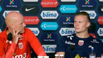 Norway's head coach Stale Solbakken (L) and Norway's forward Erling Braut Haaland address a press conference prior to a training session with the national team at Ullevaal Stadium in Oslo on May 30, 2022. - Norway OUT (Photo by Javad Parsa / NTB / AFP) / Norway OUT (Photo by JAVAD PARSA/NTB/AFP via Getty Images)