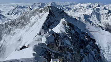 (FILES) In this file photo taken on May 31, 2021 the Himalayan Range is seen from the summit of Mount Everest (8,849 metres) in Nepal. Nepali climber Kami Rita Sherpa reached the top of Mount Everest for the 27th time on May 17, reclaiming the record for the most summits of the world's highest mountain. (Photo by Lakpa SHERPA / AFP)