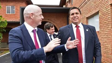 President of the international football federation (FIFA) Gianni Infantino (L) and Paraguayan Football Association President Robert Harrison (R) attend the inauguration of the Women's Football High-Performance Centre (CARFEM)in Ypane, Paraguay, on October 11, 2022. (Photo by NORBERTO DUARTE / AFP) (Photo by NORBERTO DUARTE/AFP via Getty Images)
