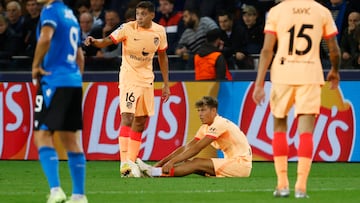 Soccer Football - Champions League - Group B - Club Brugge v Atletico Madrid - Jan Breydel Stadium, Bruges, Belgium - October 4, 2022 Atletico Madrid's Marcos Llorente goes down after sustaining an injury as Nahuel Molina looks on REUTERS/Yves Herman