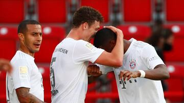 Soccer Football - Bundesliga - 1. FC Union Berlin v Bayern Munich - Stadion An der Alten Forsterei, Berlin, Germany - May 17, 2020 Bayern Munich's Benjamin Pavard celebrates scoring their second goal with David Alaba, as play resumes behind closed