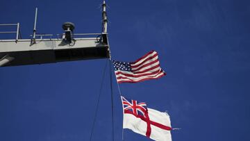 The United States of America flag and the Royal Navy ensign fly from the USS Gerald R. Ford, the 'world's largest warship', during a media visit while it is anchored in the Solent during a stopover in Portsmouth on it's maiden deployment. Picture date: Thursday November 17, 2022. (Photo by Andrew Matthews/PA Images via Getty Images)