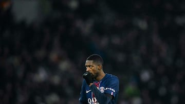 Paris Saint-Germain's French forward #10 Ousmane Dembele reacts during the French L1 football match between Paris Saint-Germain (PSG) and Paris FC at the Parc des Princes stadium in Paris on January 4, 2026. (Photo by Blanca CRUZ / AFP)