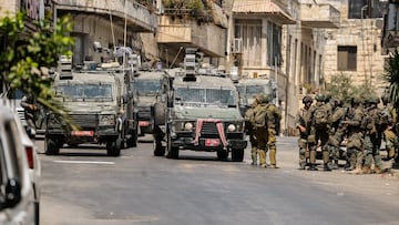 Israeli soldiers take part in an Israeli raid an Israeli raid in Nablus, the Israeli-occupied West Bank, June 10, 2025. REUTERS/Raneen Sawafta